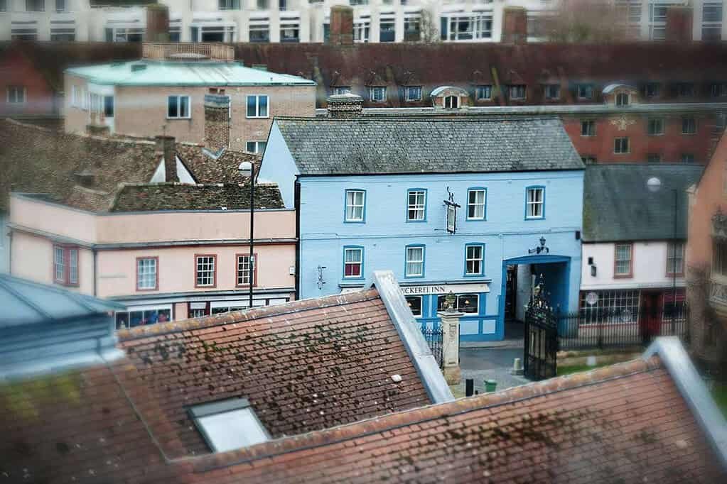 Charming blue historic inn in Cambridge city centre with traditional architecture and vibrant surroundings.